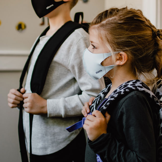 School children wear face masks
